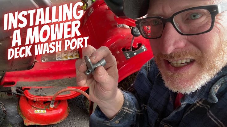 drilling and installing deck wash port on a stamped mower deck